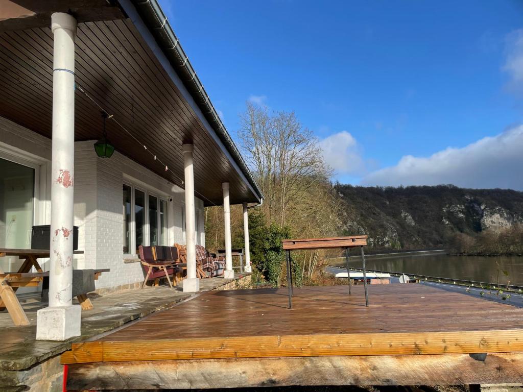 a wooden deck on the side of a house at Le Paradis Mosan in Waulsort