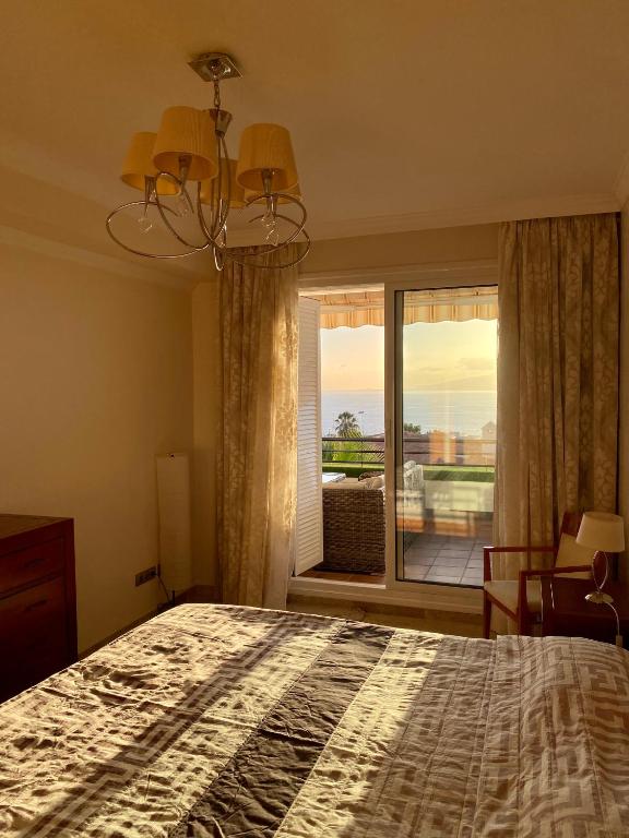 Posteľ alebo postele v izbe v ubytovaní Apartment with spectacular view in Puerto Santiago