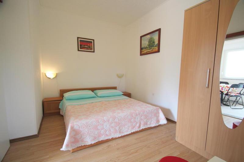 Posteľ alebo postele v izbe v ubytovaní Apartment Umag Lukin
