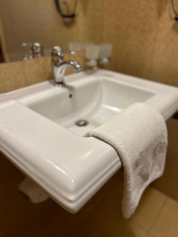 Koupelna v ubytování Hotel Wileński