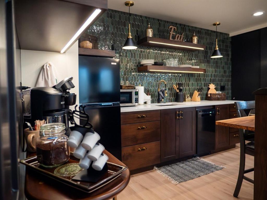 a kitchen with a coffee maker on a table at Downtown Boise Sunset Ave Romantic Private Suite in Boise