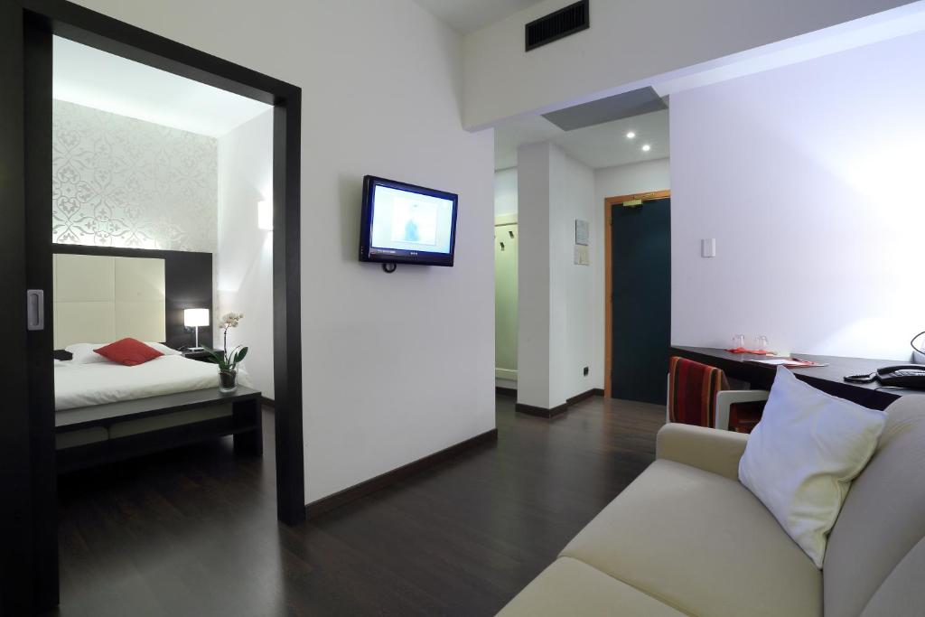 Postel nebo postele na pokoji v ubytování Hotel La Torretta