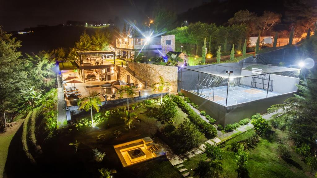 an aerial view of a house at night at Finca Amatista in Guarne