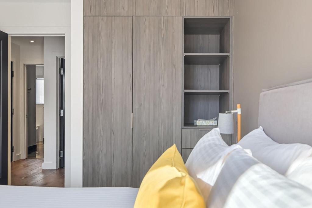 Llit o llits en una habitació de Condos Kamik Tremblant