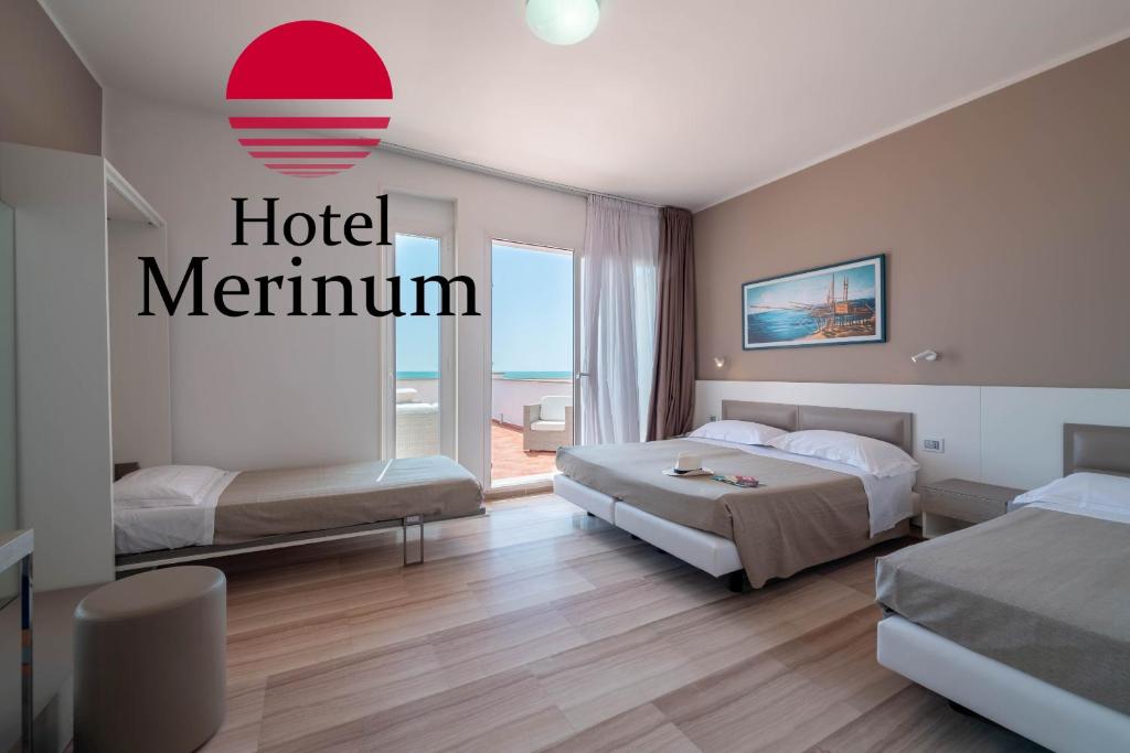 Letto o letti in una camera di Hotel Merinum