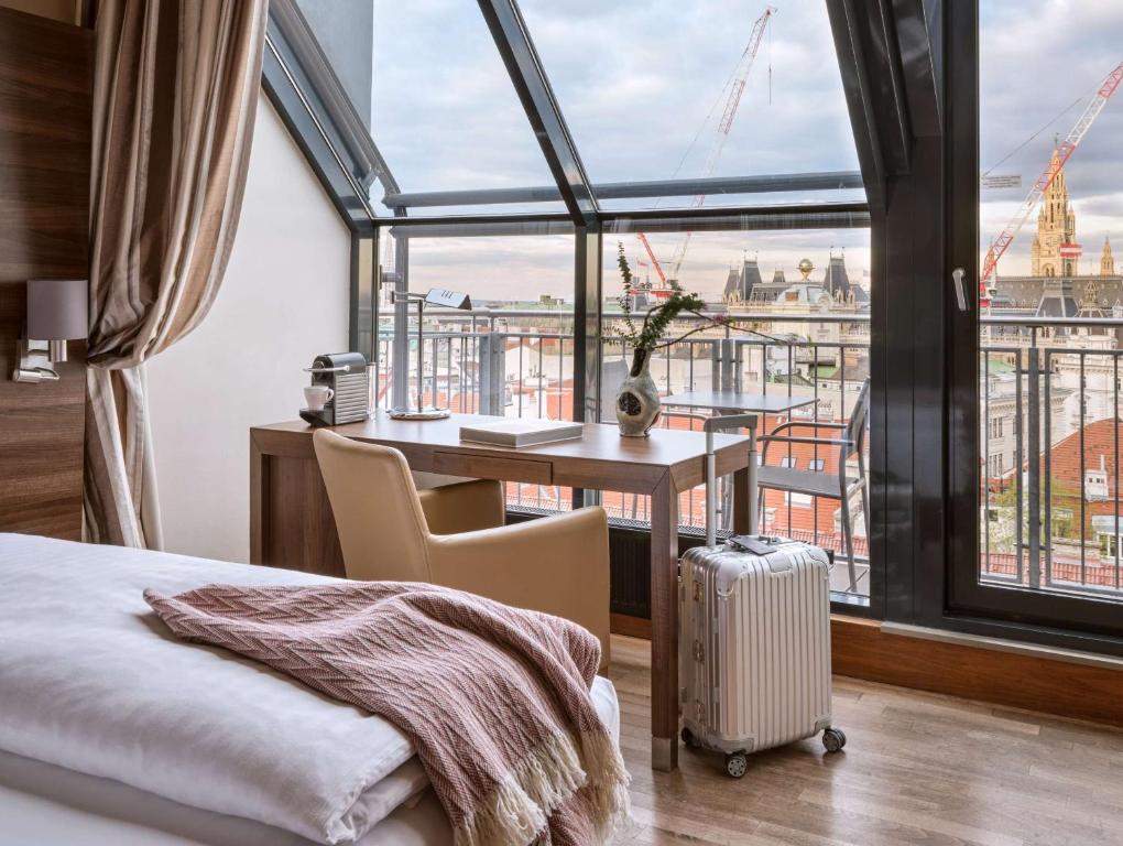 Postel nebo postele na pokoji v ubytování Flemings Selection Hotel Wien-City