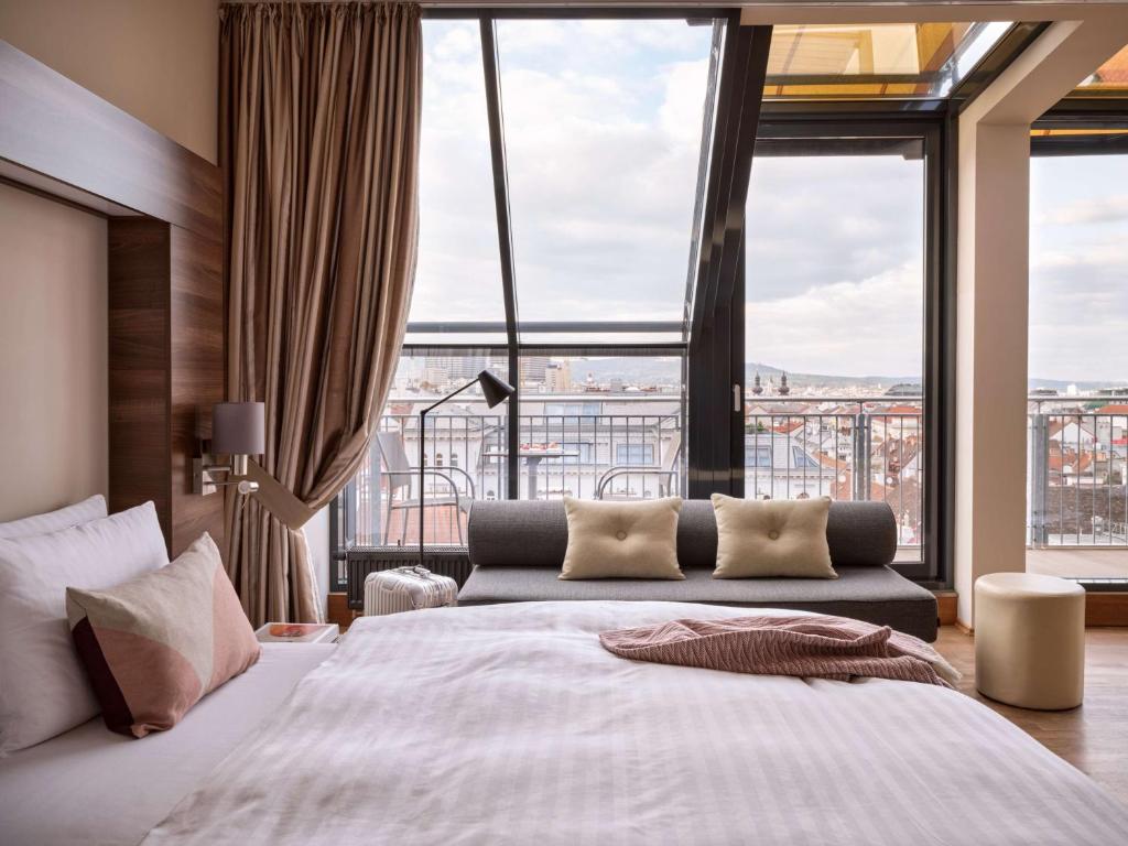 Postel nebo postele na pokoji v ubytování Flemings Selection Hotel Wien-City