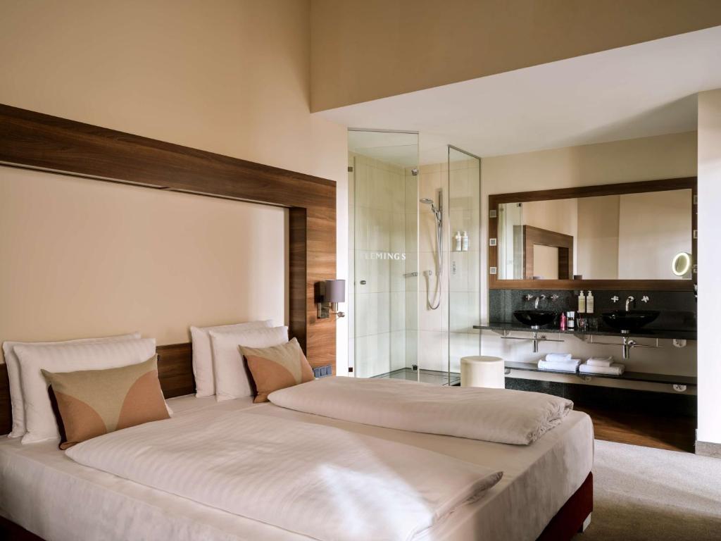 Postel nebo postele na pokoji v ubytování Flemings Selection Hotel Wien-City
