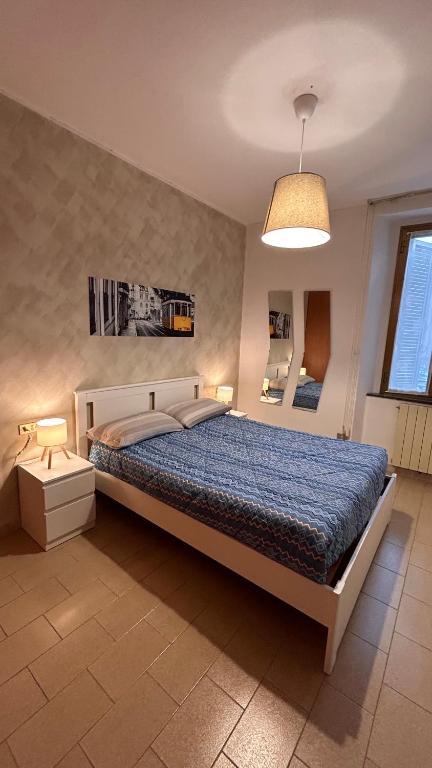 Postel nebo postele na pokoji v ubytování Appartamento Mino