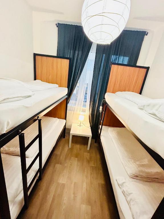 Postel nebo postele na pokoji v ubytování Hostel good price