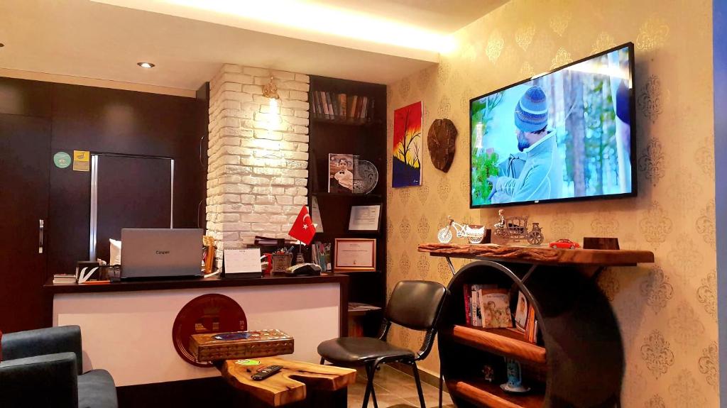 TV a/nebo společenská místnost v ubytování Samlife Apart