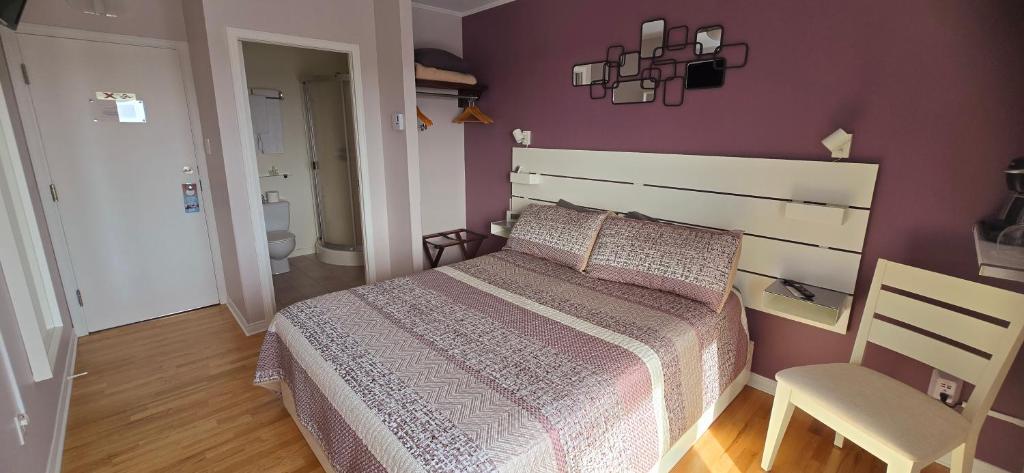 Voodi või voodid majutusasutuse Auberge Fleurs de Lune toas