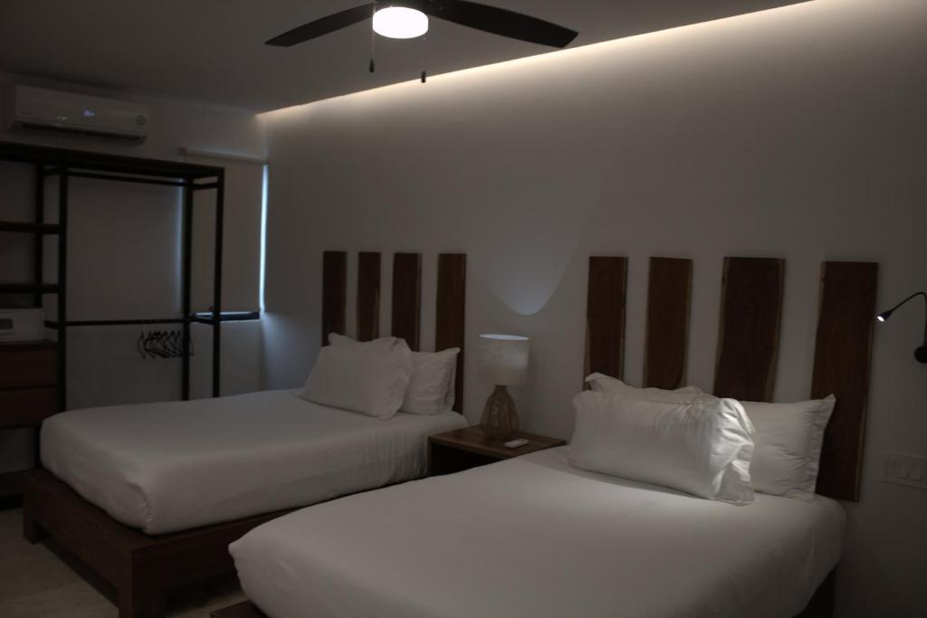 Postel nebo postele na pokoji v ubytování Hotel B10 - Distinctive Hotel-