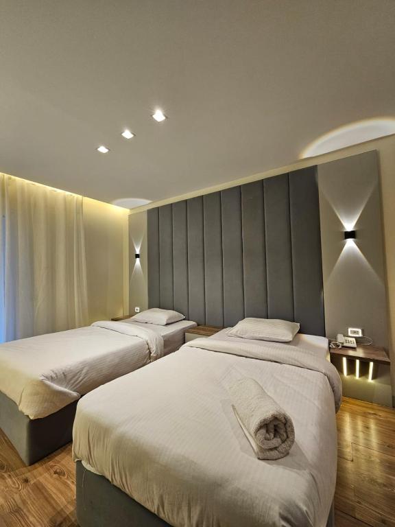 Postel nebo postele na pokoji v ubytování Sheraton Ocean 7-PRIVATE SUITES