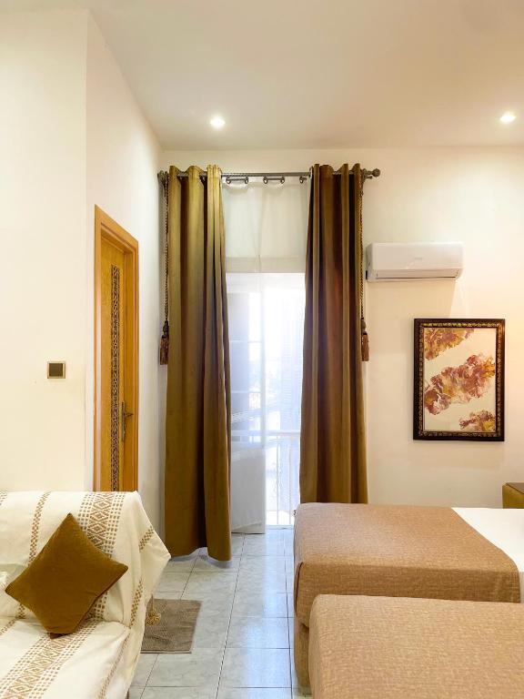Χώρος καθιστικού στο Hotel Palace tanger