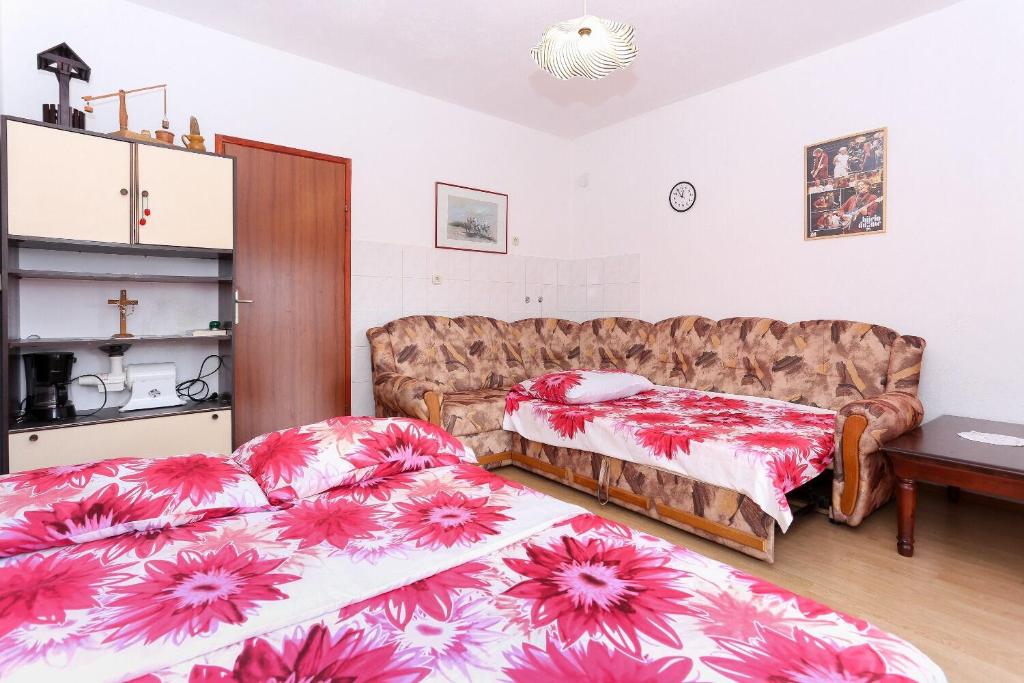 Posteľ alebo postele v izbe v ubytovaní House Marcelo