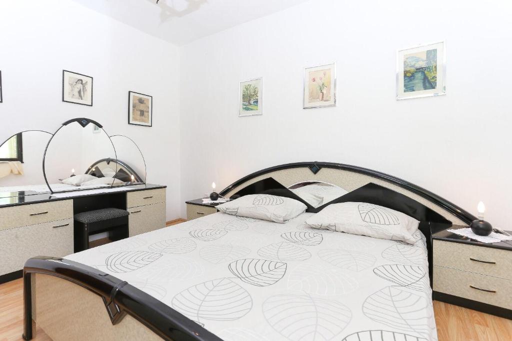 Posteľ alebo postele v izbe v ubytovaní House Marcelo