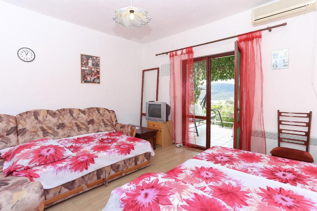 Posteľ alebo postele v izbe v ubytovaní House Marcelo