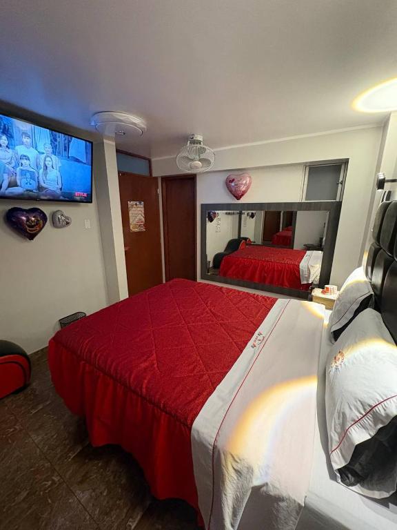Postel nebo postele na pokoji v ubytování Hospedaje W ISKAY