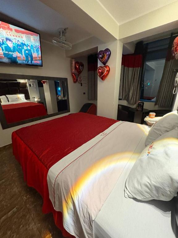 Postel nebo postele na pokoji v ubytování Hospedaje W ISKAY