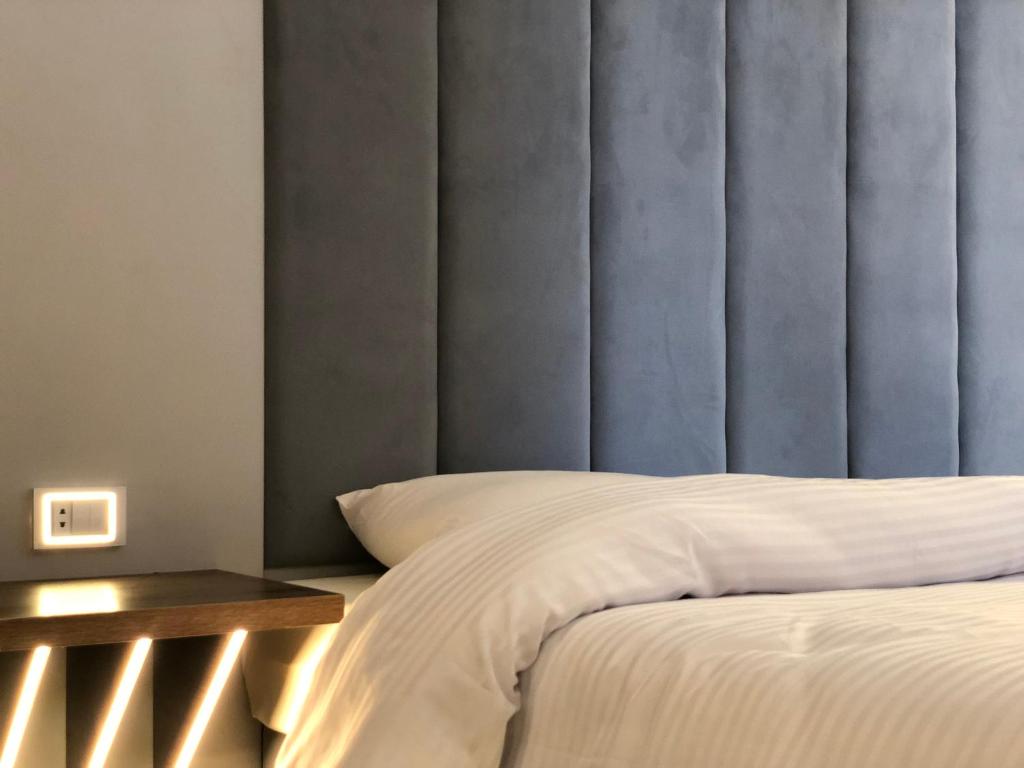 Postel nebo postele na pokoji v ubytování Sheraton Ocean 7-PRIVATE SUITES
