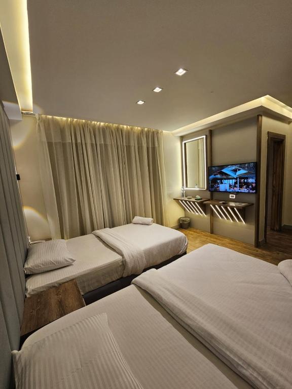 Postel nebo postele na pokoji v ubytování Sheraton Ocean 7-PRIVATE SUITES