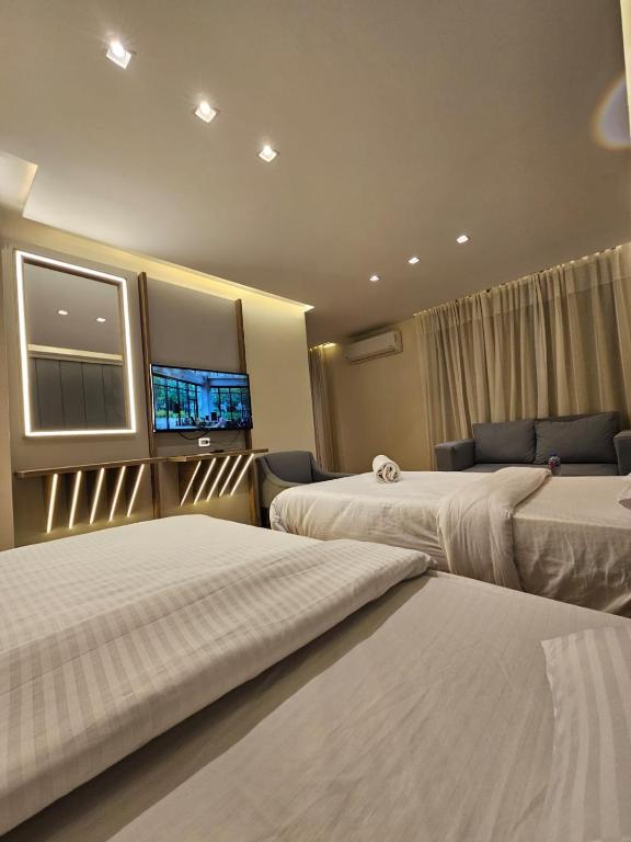 Postel nebo postele na pokoji v ubytování Sheraton Ocean 7-PRIVATE SUITES