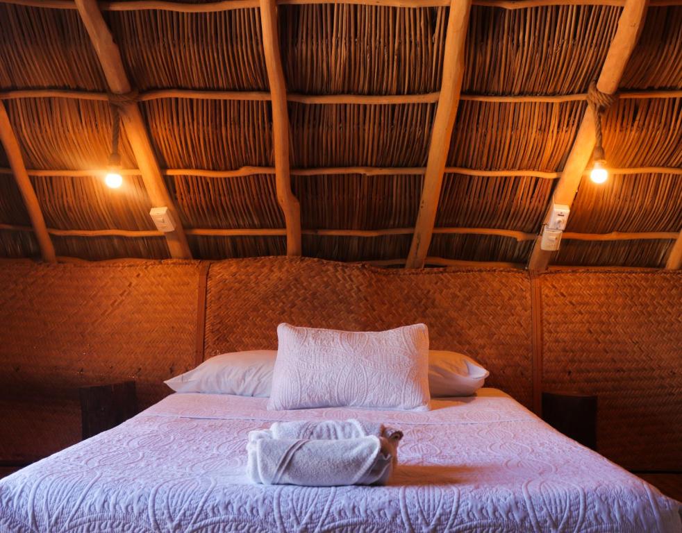 Postel nebo postele na pokoji v ubytování La Redonda Sayulita Hostal
