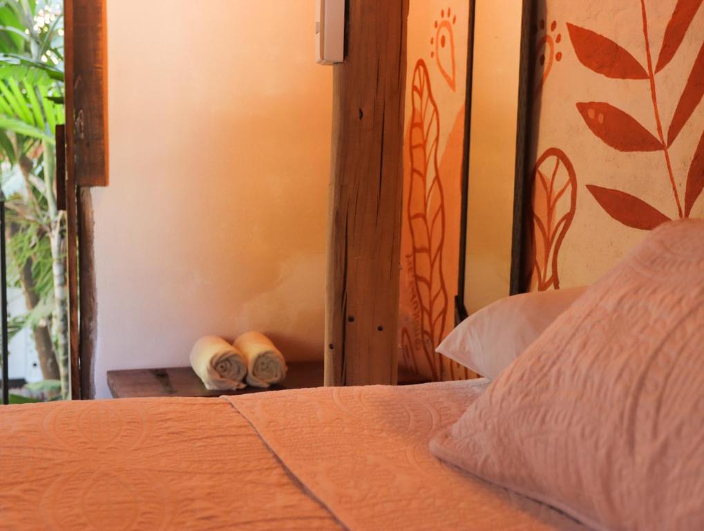 Postel nebo postele na pokoji v ubytování La Redonda Sayulita Hostal