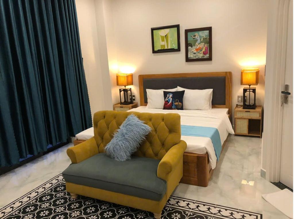 Postel nebo postele na pokoji v ubytování Longs Beach House - Wonderland Hồ Tràm