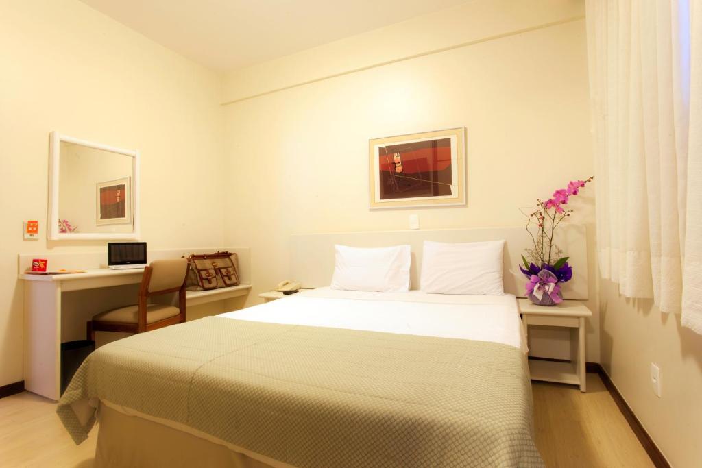 A bed or beds in a room at Boulevard Express