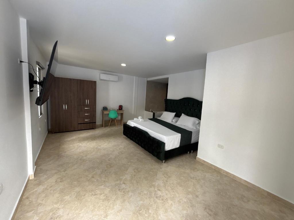 Postel nebo postele na pokoji v ubytování Hotel Boutique Campestre