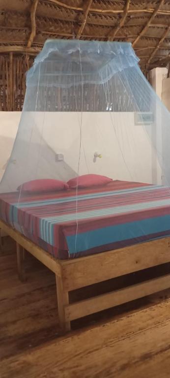 Letto o letti in una camera di The Alpha Monkey hotel & Tree house