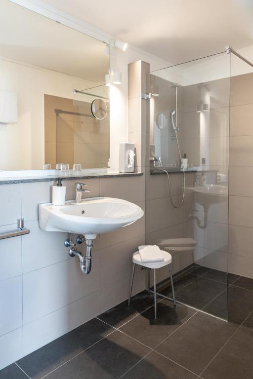 Koupelna v ubytování Hotel Lüneburg Süd