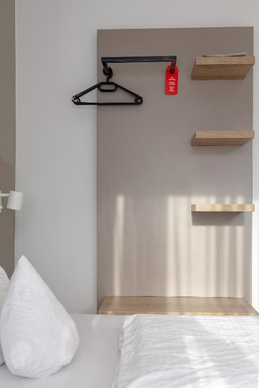 Postel nebo postele na pokoji v ubytování Hotel Lüneburg Süd