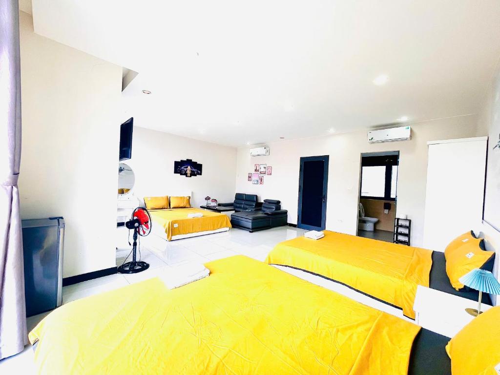 Postel nebo postele na pokoji v ubytování Mila Homestay Grand World Phú Quốc