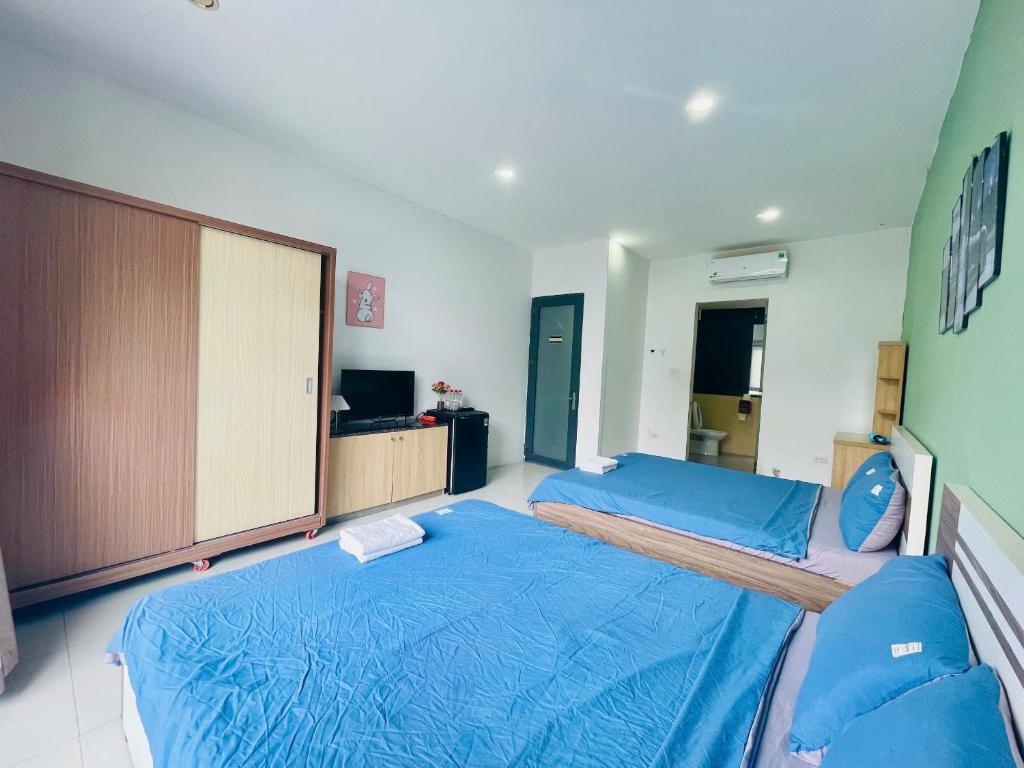 Postel nebo postele na pokoji v ubytování Mila Homestay Grand World Phú Quốc