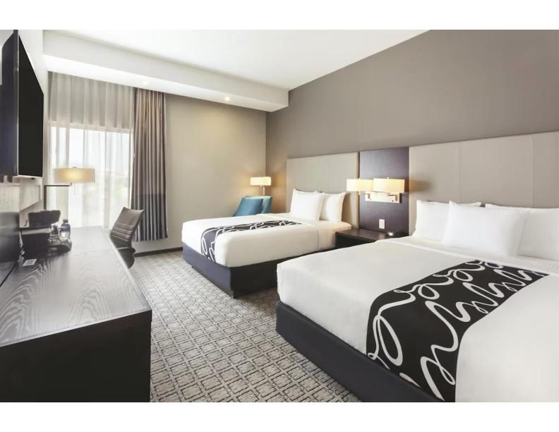 Voodi või voodid majutusasutuse Hotel Plaza Cascadas toas