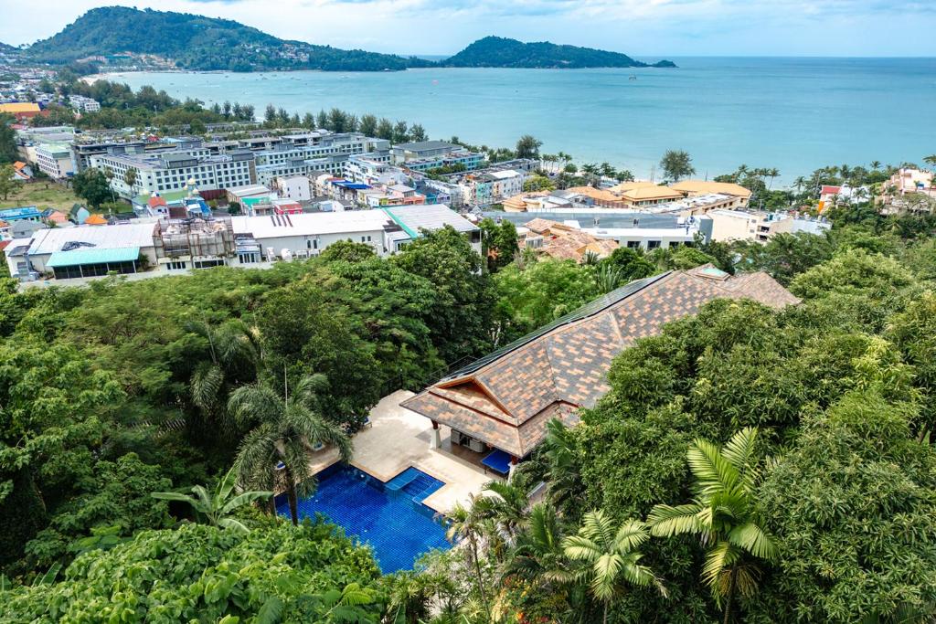 an aerial view of a house on a hill at 芭东日月双海景别墅 in Patong Beach