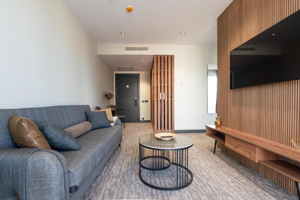 TV a/nebo společenská místnost v ubytování NOVA LUXE Hotel & Residences