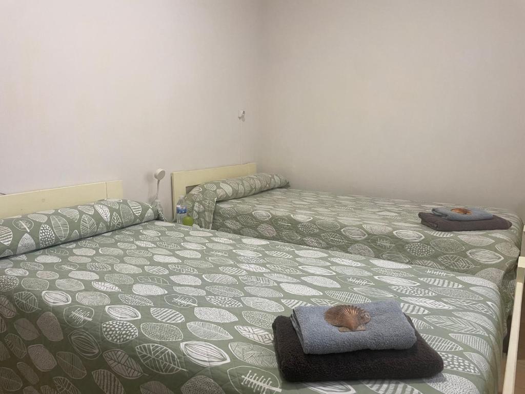 Posteľ alebo postele v izbe v ubytovaní Las Hadas Albergue -solo para Peregrinos - Vegano -Bar