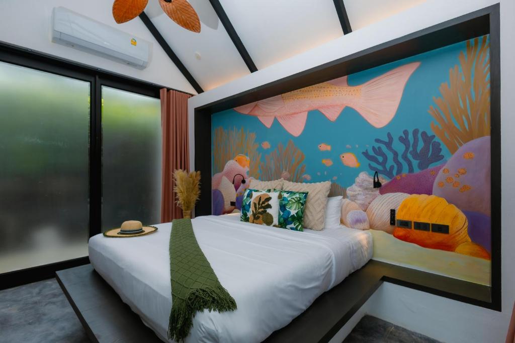 Postel nebo postele na pokoji v ubytování Tolani Resort Koh Samui
