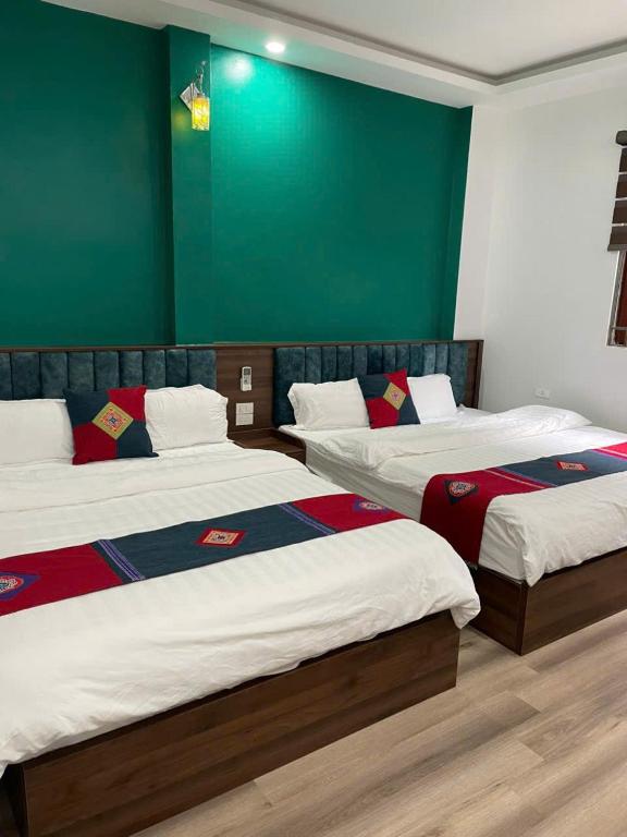 Postel nebo postele na pokoji v ubytování Harmony Haven Hotel
