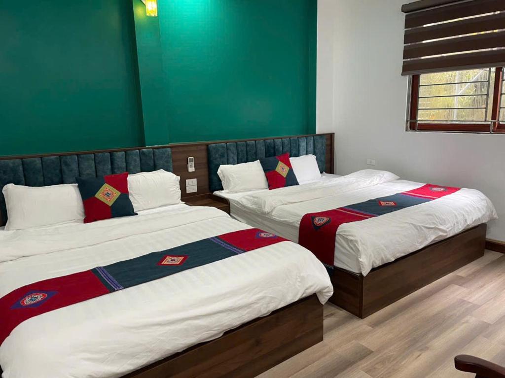 Postel nebo postele na pokoji v ubytování Harmony Haven Hotel