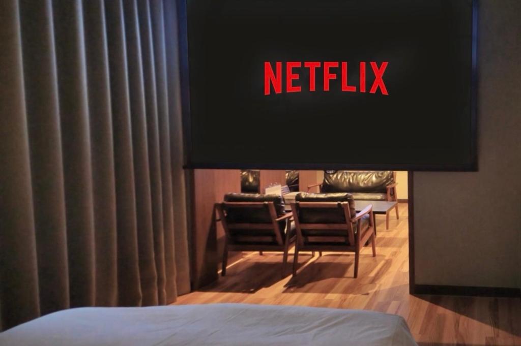 Postel nebo postele na pokoji v ubytování Gapyeong hotel GRAZIE