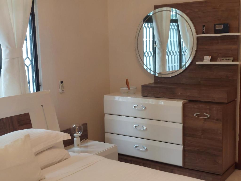 Postel nebo postele na pokoji v ubytování Reef Hills Residence