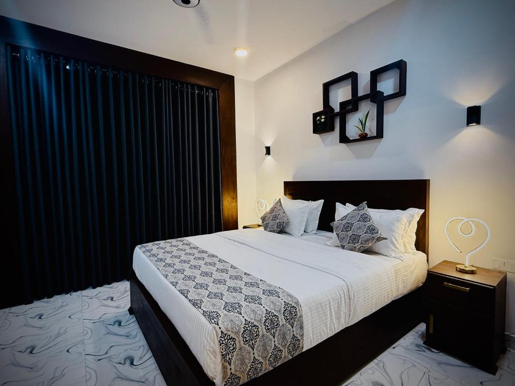 Postel nebo postele na pokoji v ubytování Aloe Transit Hotel
