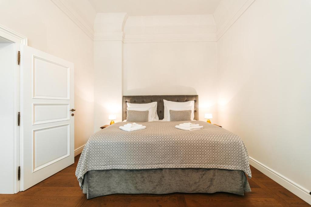 Postel nebo postele na pokoji v ubytování Hotel Château Gbeľany