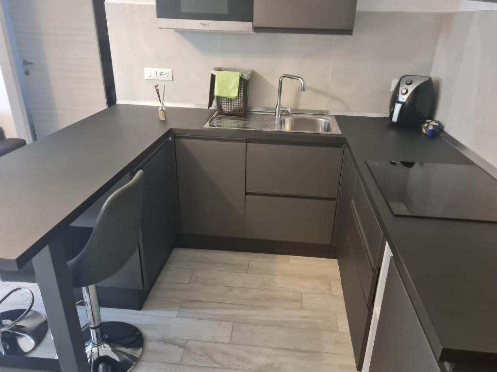 Kuchyň nebo kuchyňský kout v ubytování Residenza Lido adriano baia tartaruga