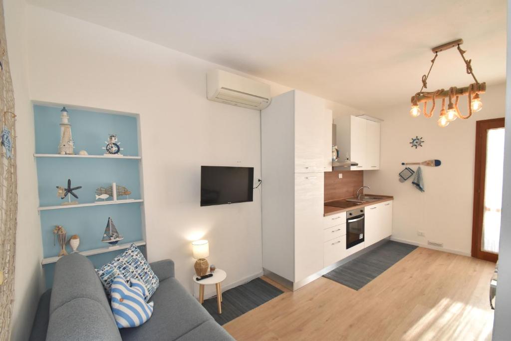 Appartamento Amapola - Bilocale in zona mare con clima e posto auto - One-Bedroom Apartment